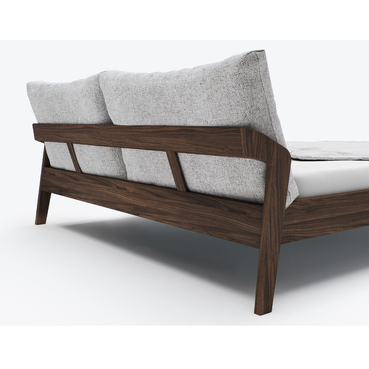 Detail vom Design Bett AINO aus massivem Nussbaumholz