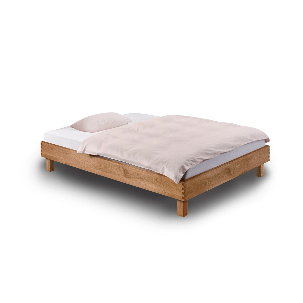 STEP-X PURE: Gezinktes Bett ohne Kopfteil aus massiver Eiche aus dem Schwarzwald